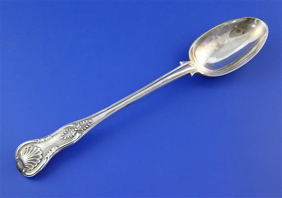 A late Victorian silver double struck Kings pattern basting spoon, 7.5 oz.